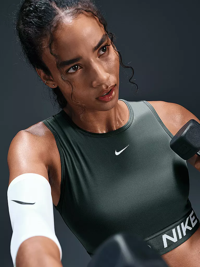 NIKE | Damen Fitnesstop Pro Cropped | dunkelgrün